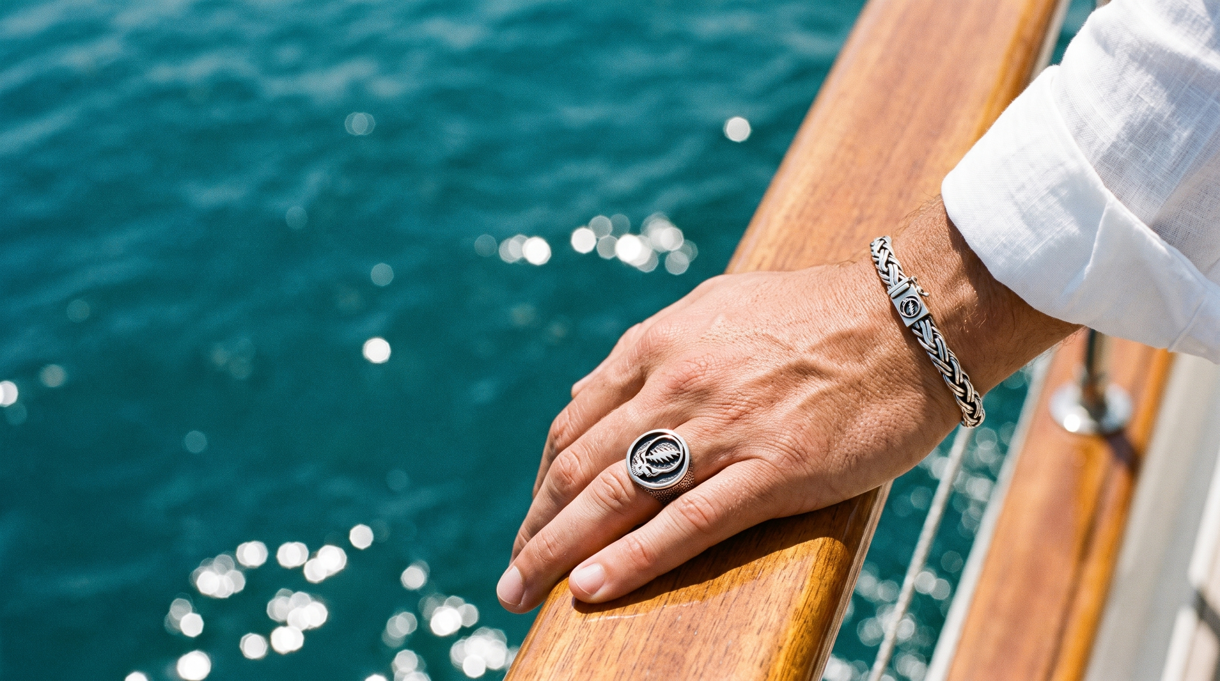 Grateful Dead Steal Your Face signet ring and chain bracelet - summer at sea