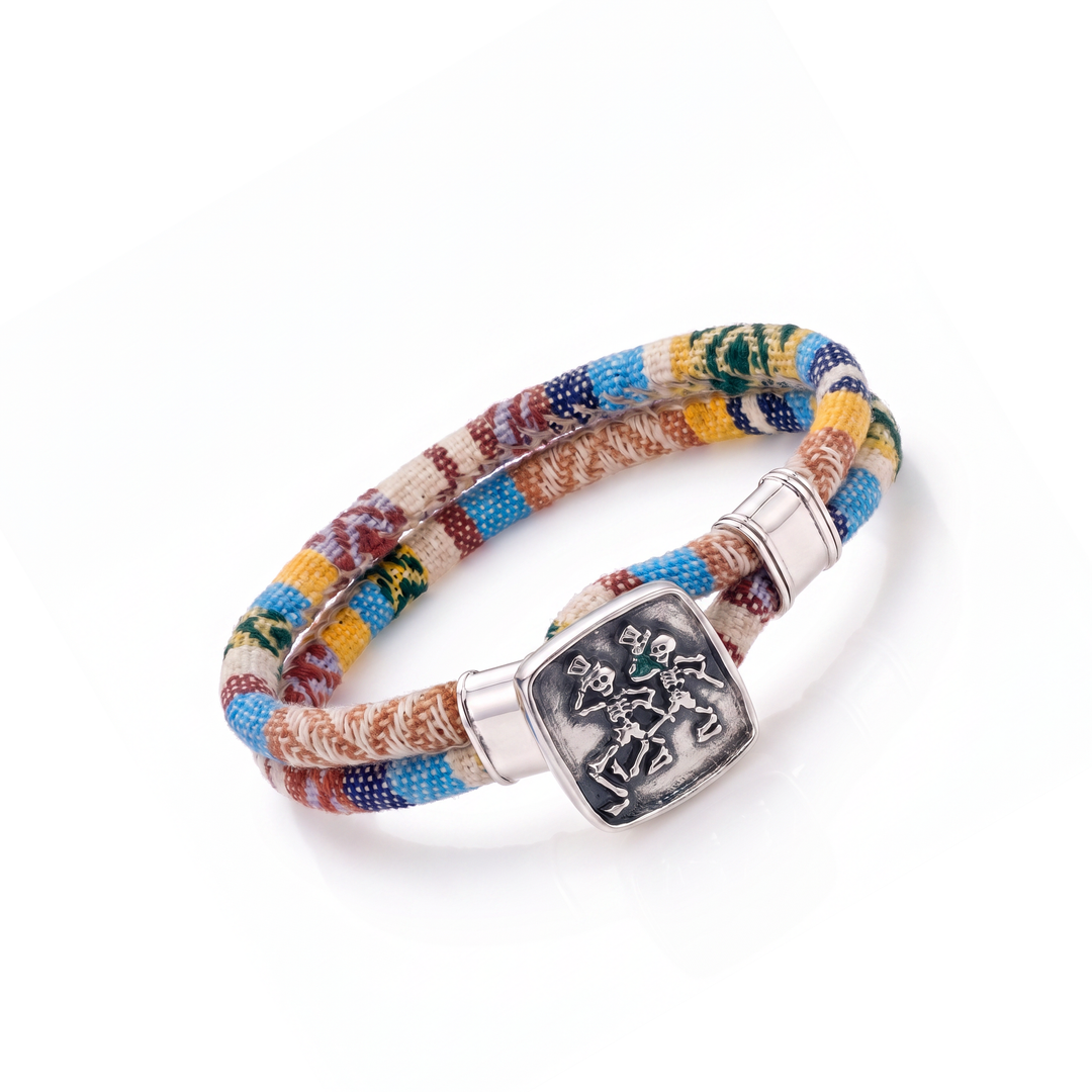 Dancing Skeletons sterling silver Harvest Dance woven cloth rope bracelet — tilted view